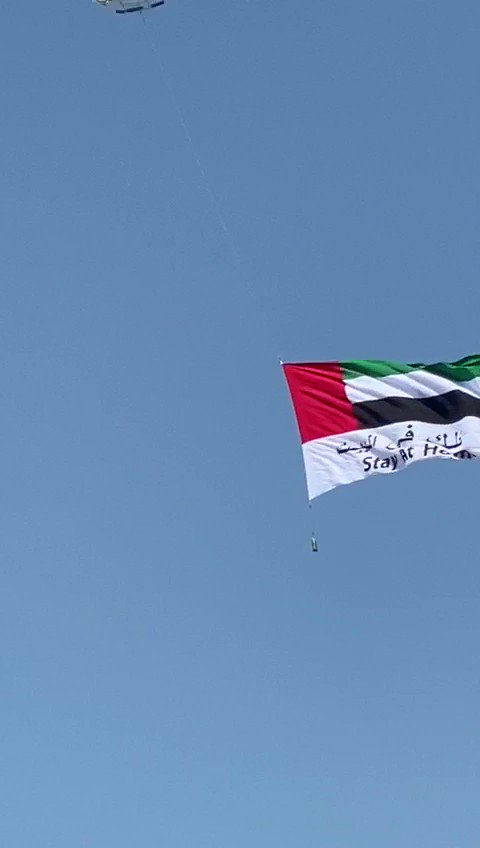 In Abu Dhabi, helicopter flying with banner stay at home