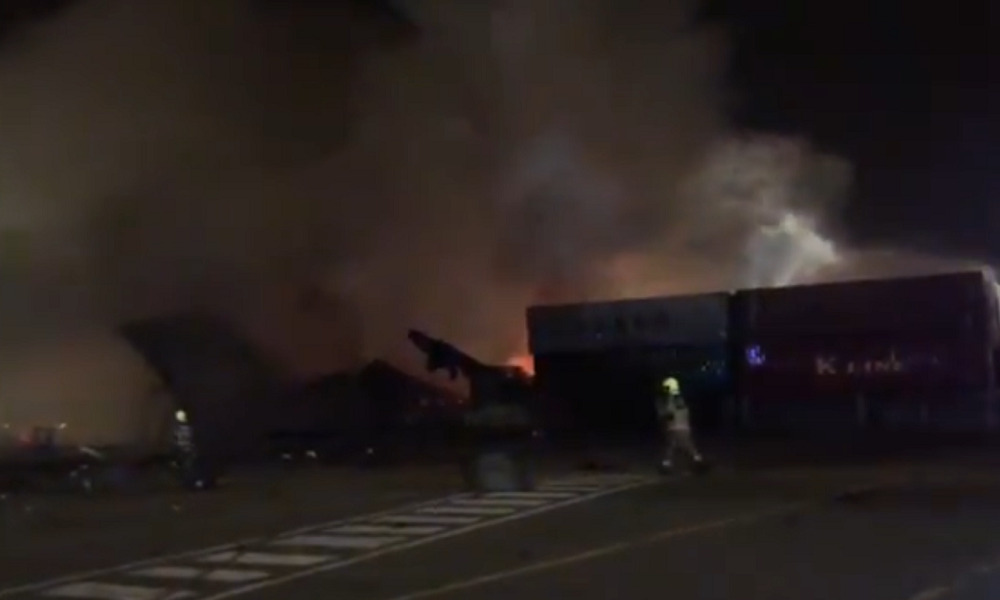 Fire under control after blast hits container ship at Dubai port; no reports of injuries